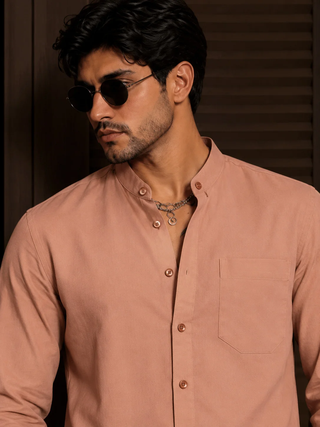 Peach shirt kurta worn by model, front close-up with mandarin collar, chest pocket and matching buttons