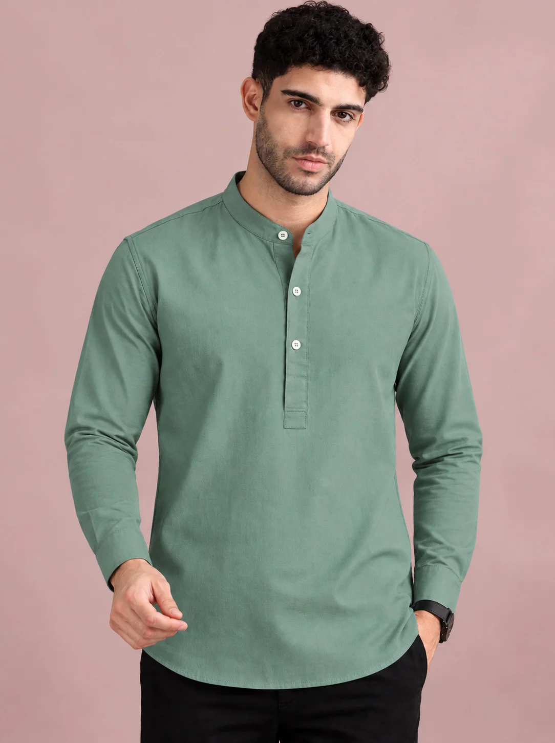 Green kurta, long sleeves, mandarin collar, five buttons, worn by a model