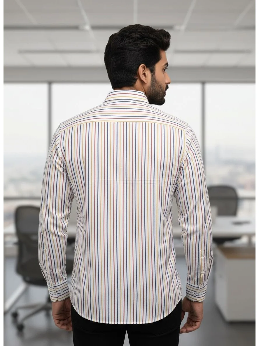 Back view of a male model wearing a multi-colour striped long-sleeve shirt with a classic collar