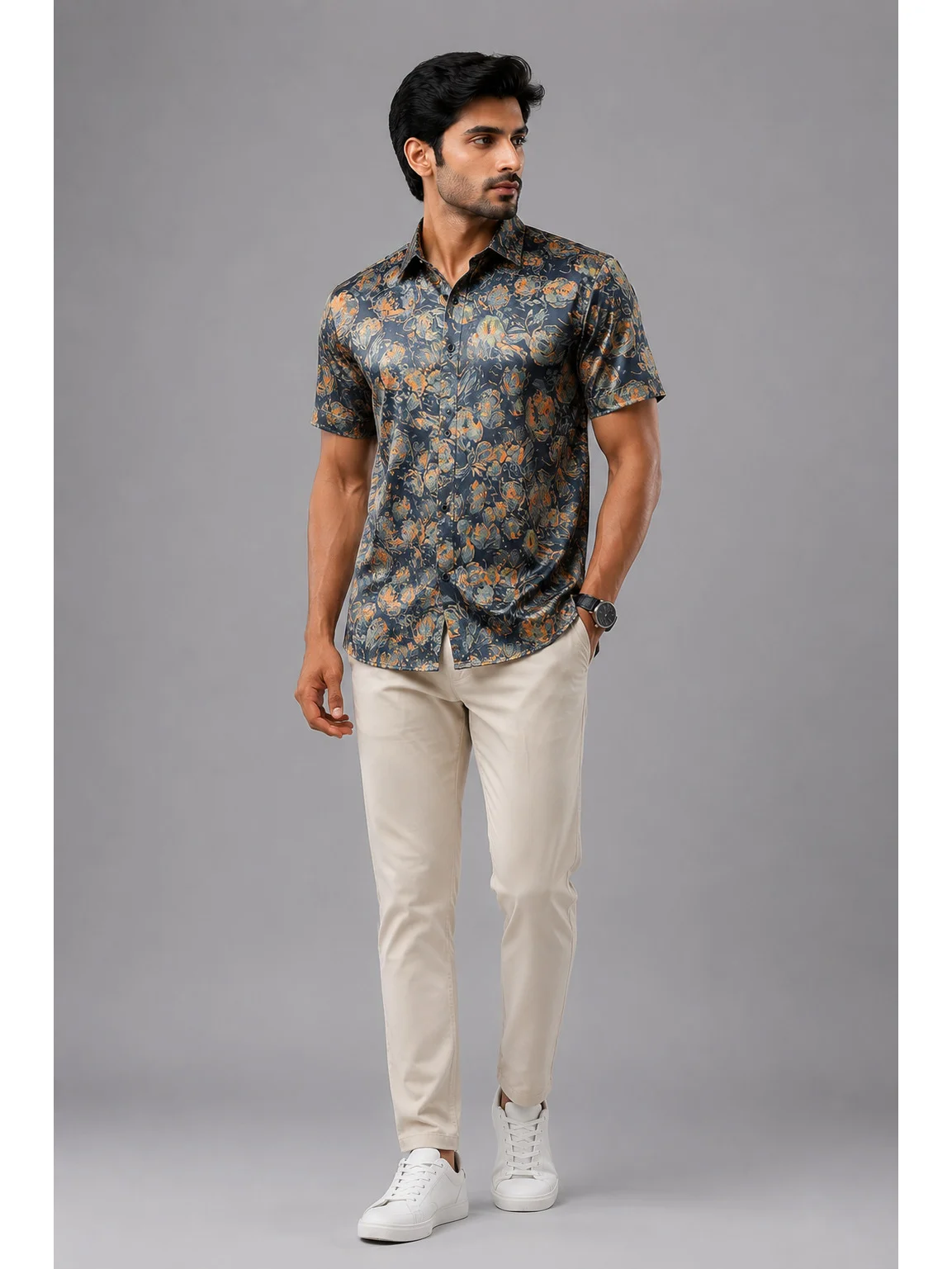 Short-sleeved shirt, slate blue with orange floral print, collar, worn by a model