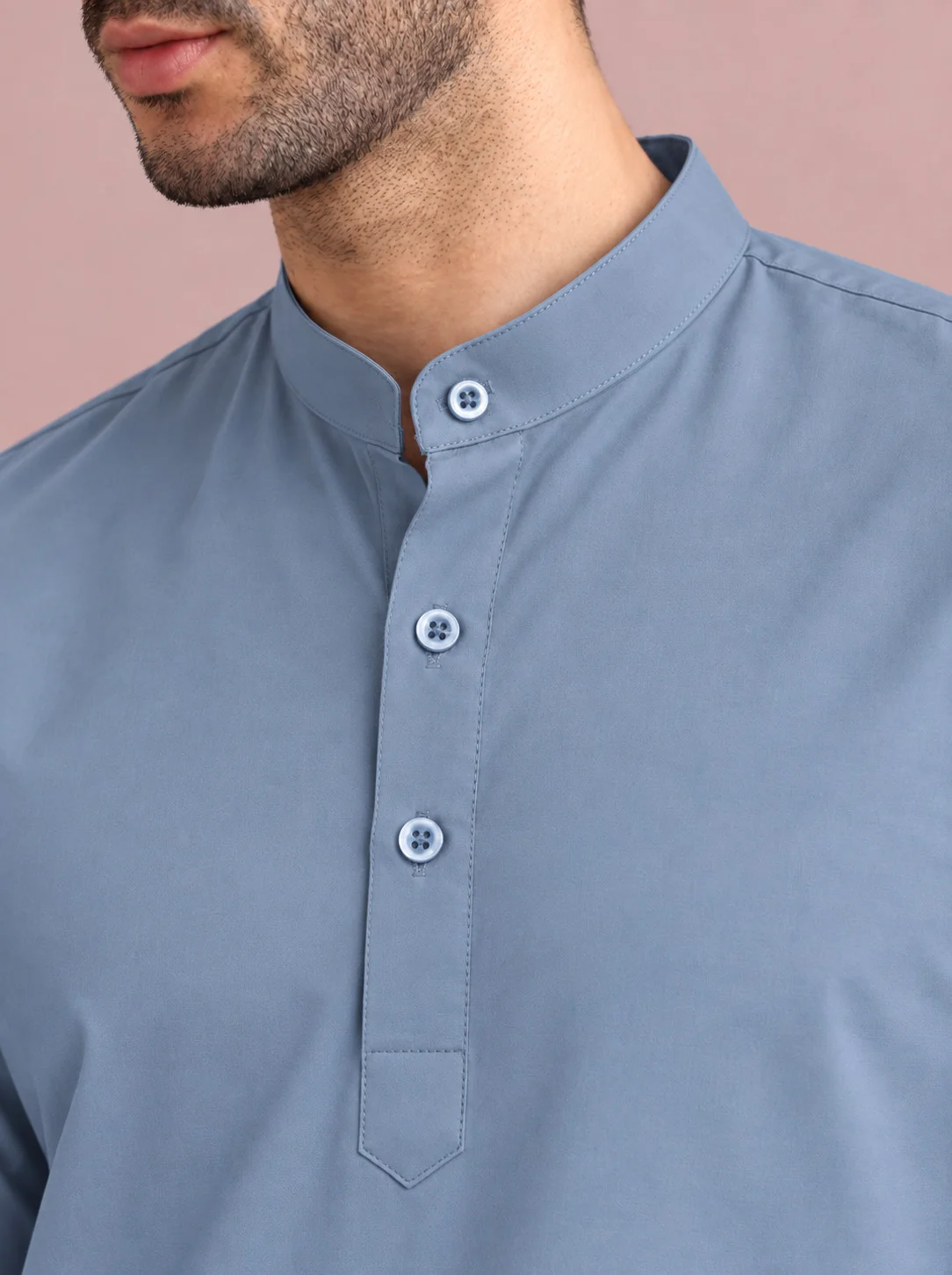 Light blue kurta, front view, mandarin collar, four buttons, pocket