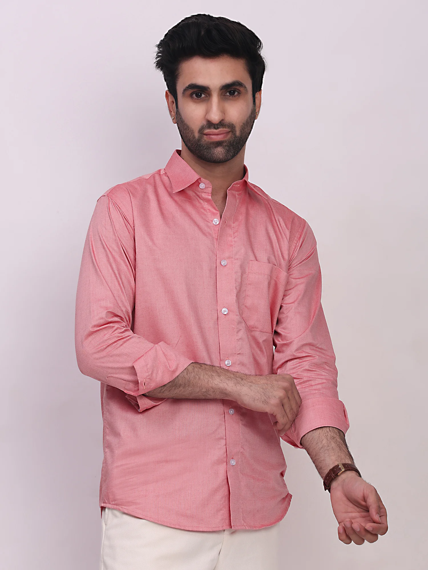 Pink button-down shirt, front view, on model, collar, cuffs, buttons, chest pocket visible