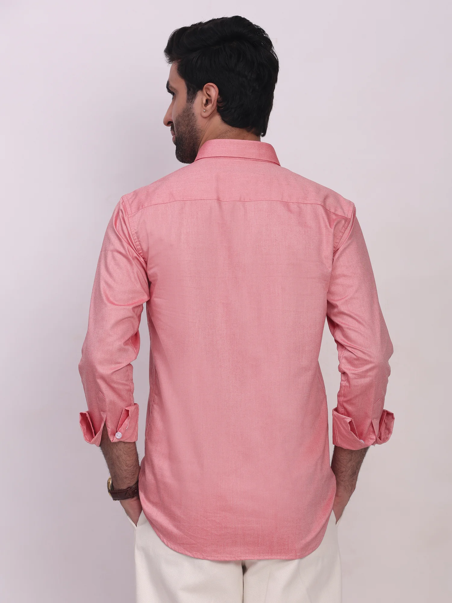 Pink shirt, back view, collar, long sleeves, button cuffs