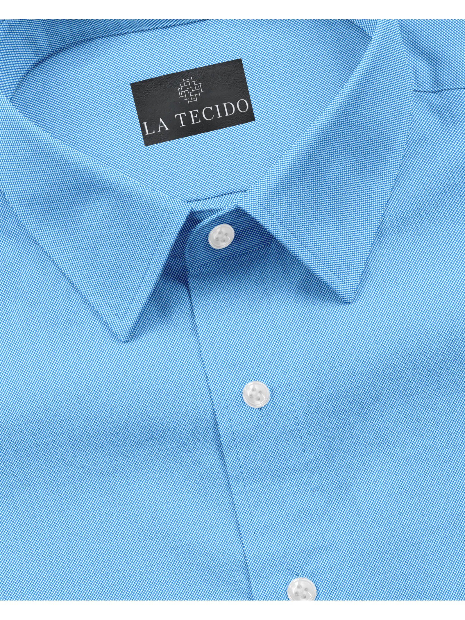 Close-up of light blue shirt collar with white buttons and textured weave