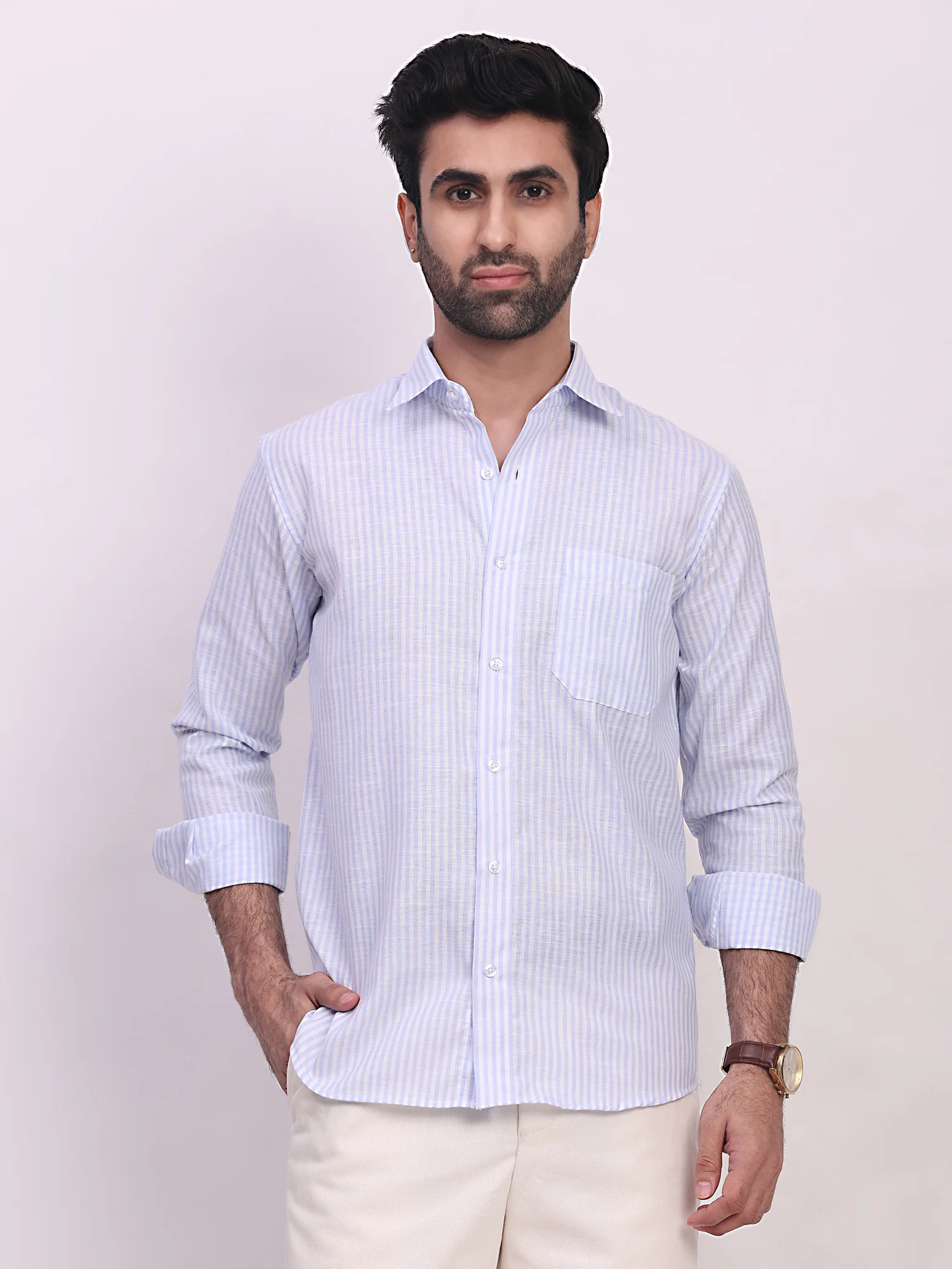 Model wearing sky blue striped long-sleeve shirt with collar and chest pocket