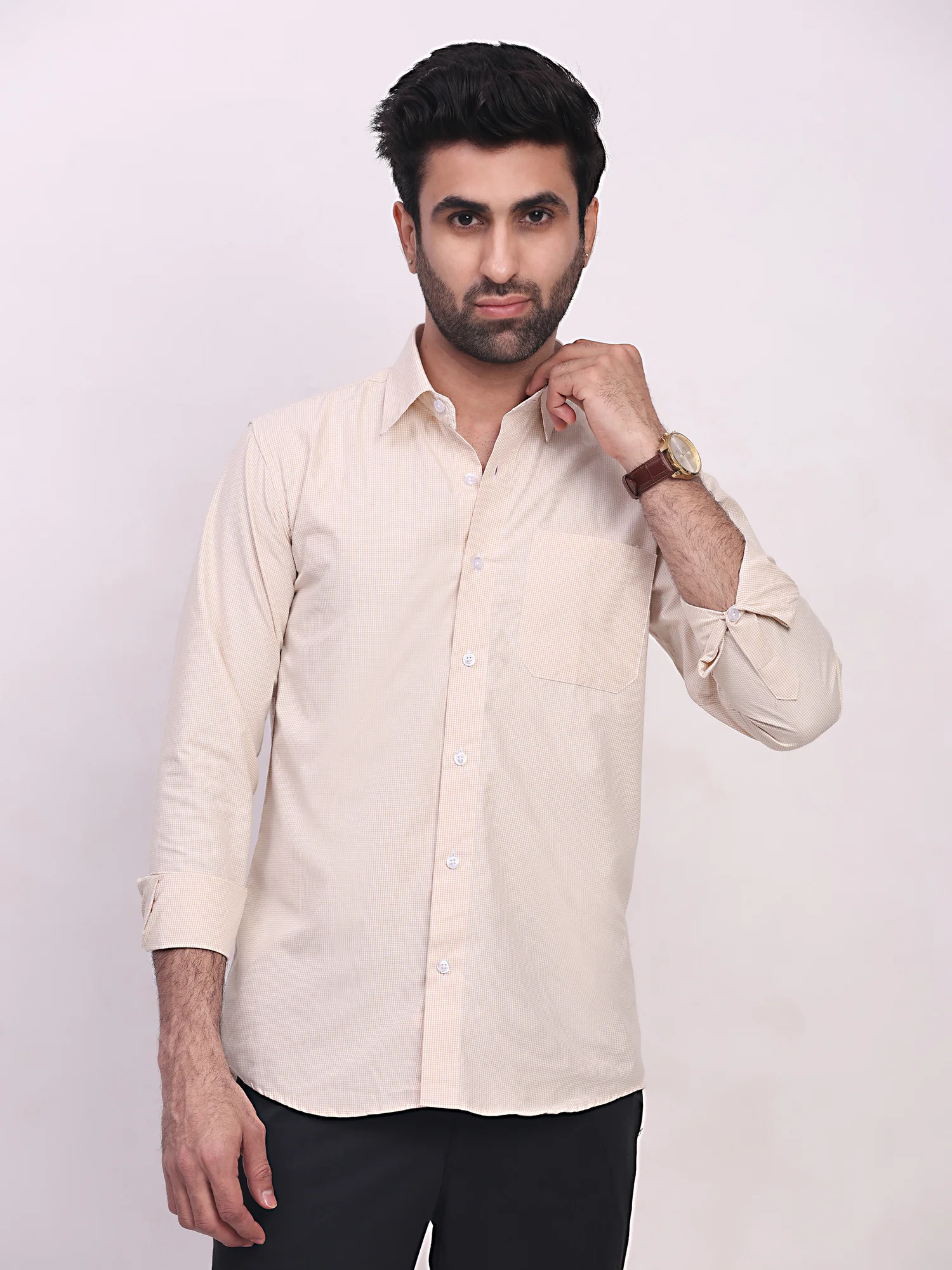 Beige checkered shirt, front view, worn by a model, collar open, buttons down, long sleeves