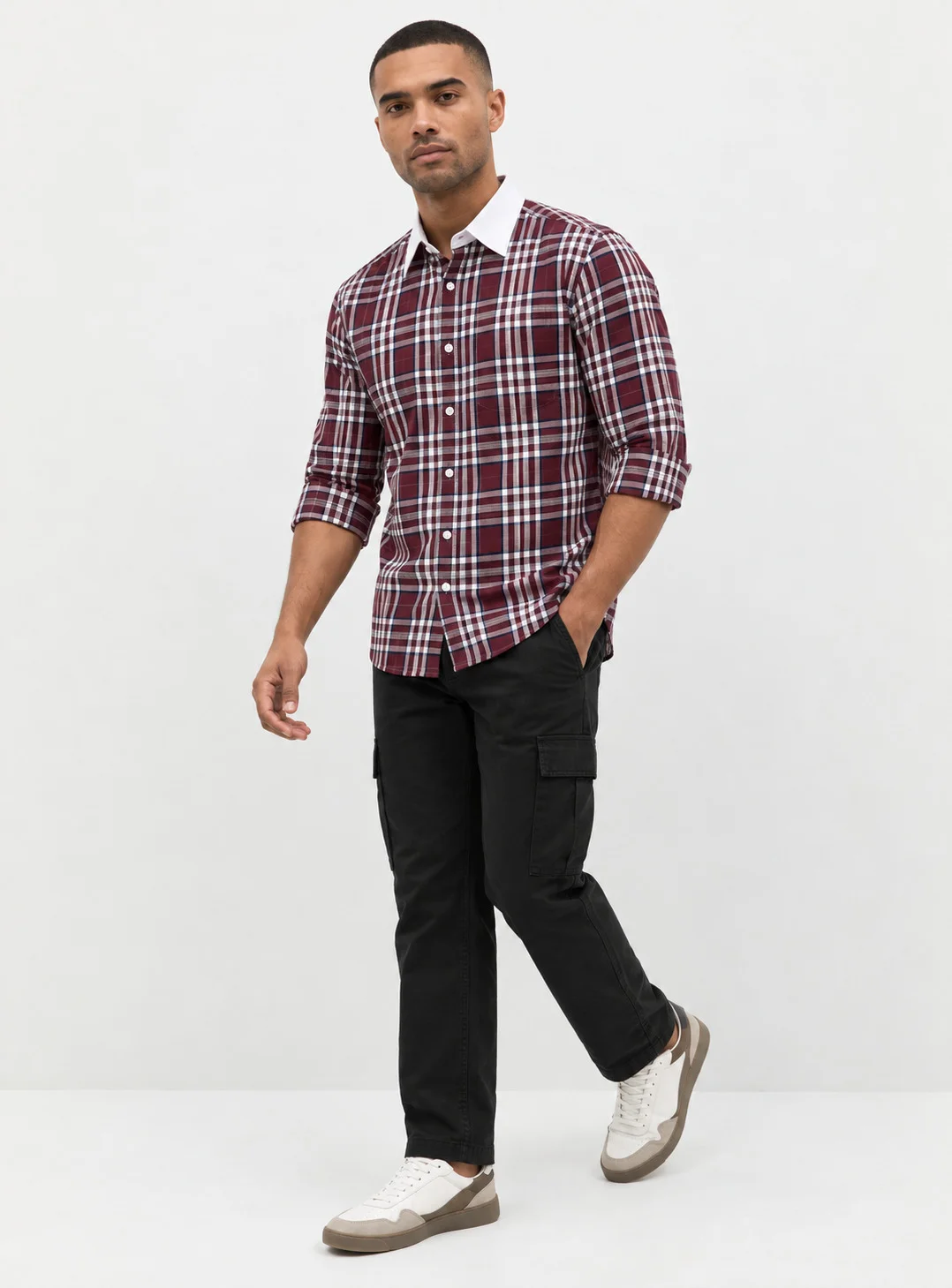 Maroon and white checkered shirt, worn by a model, front view, white collar, rolled sleeves, buttons