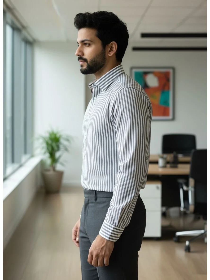 Striped shirt, white and grey, worn by a model, side view, long sleeves, collar