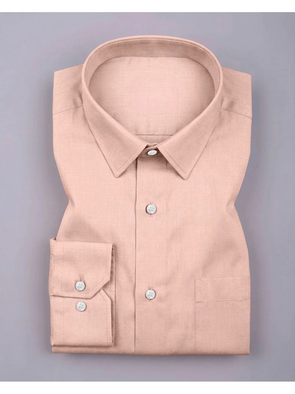 Pinkish beige dress shirt, folded, front view, point collar, buttons, cuffs