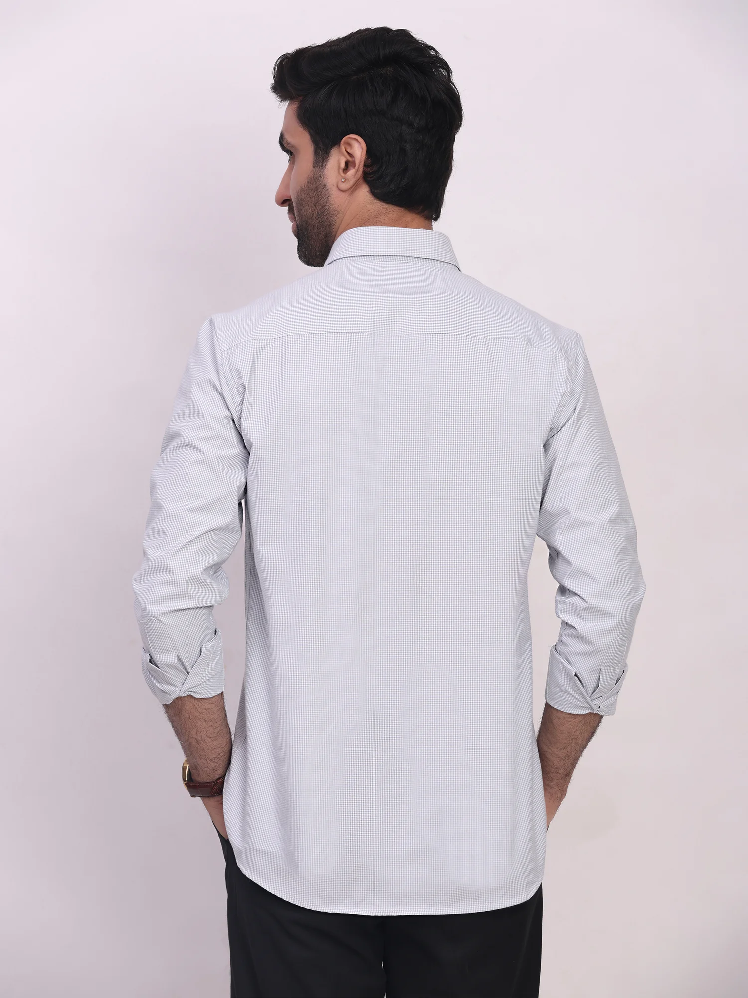 Grey checkered shirt, back view, worn by a model, long sleeves