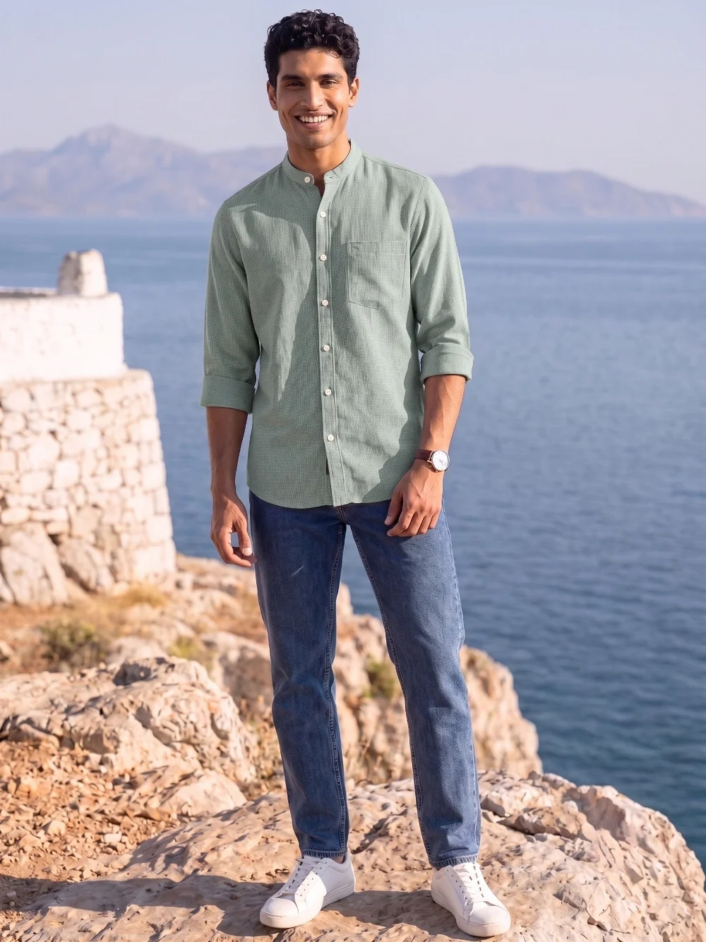 Green kurta with mandarin collar, rolled sleeves, and pocket, worn by a model