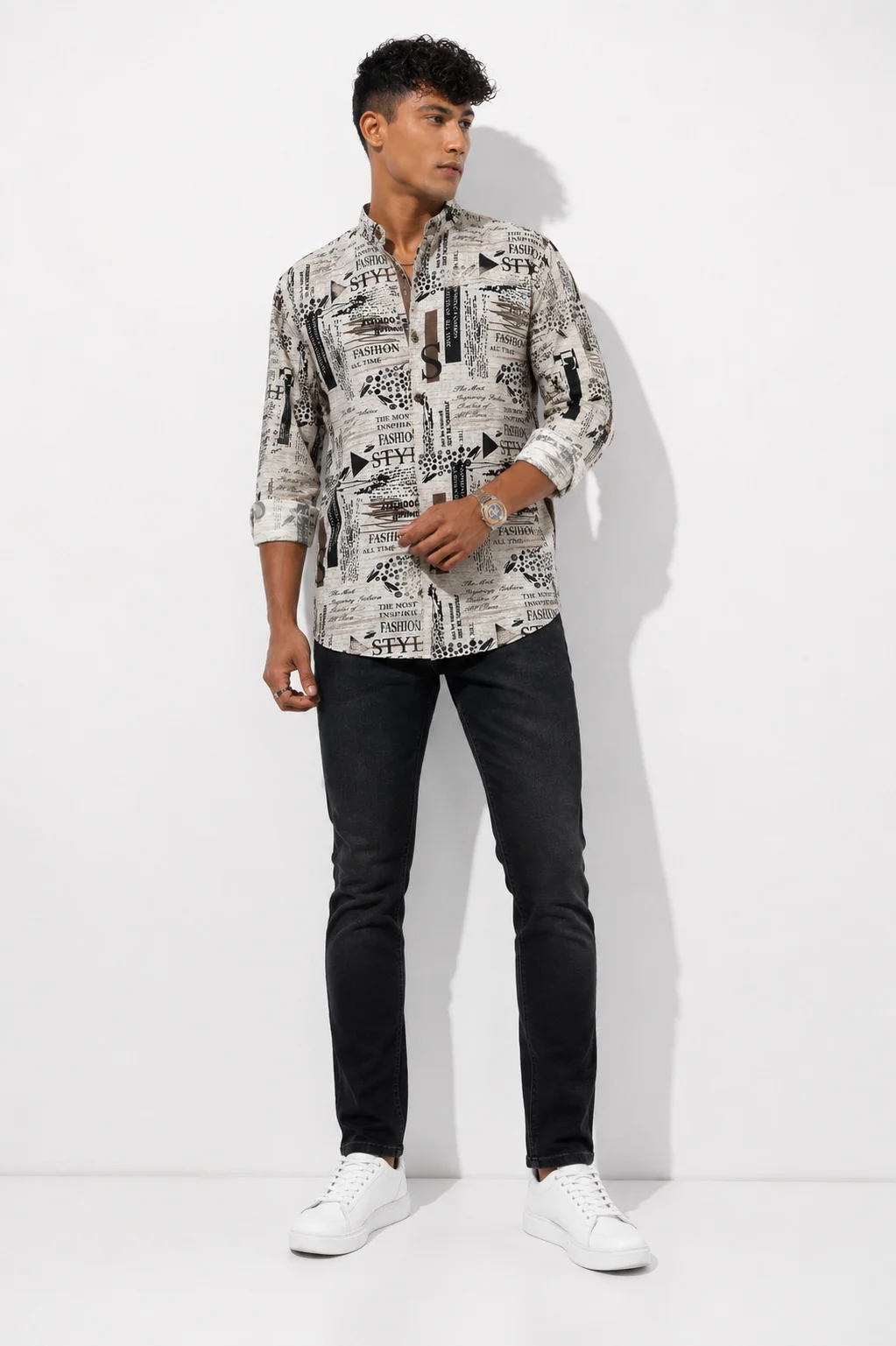Long sleeve shirt, beige with black text print, worn by a model, three-quarter view