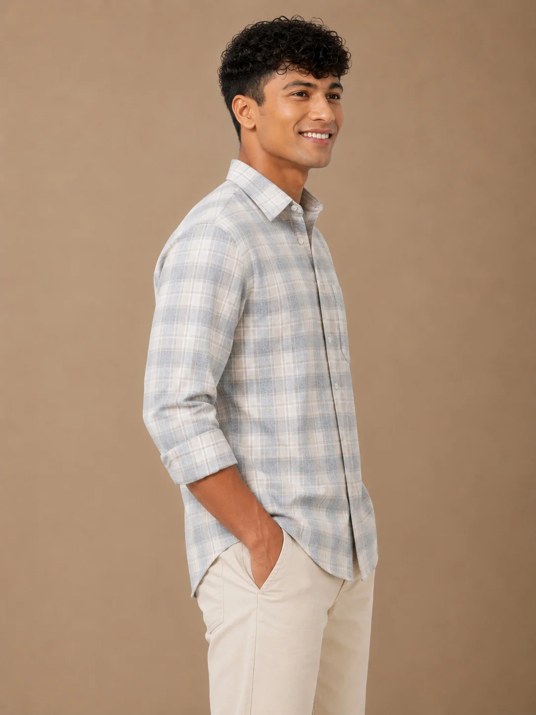 Shirt, grey and white check, worn by model, side view, collar, buttons, rolled sleeves