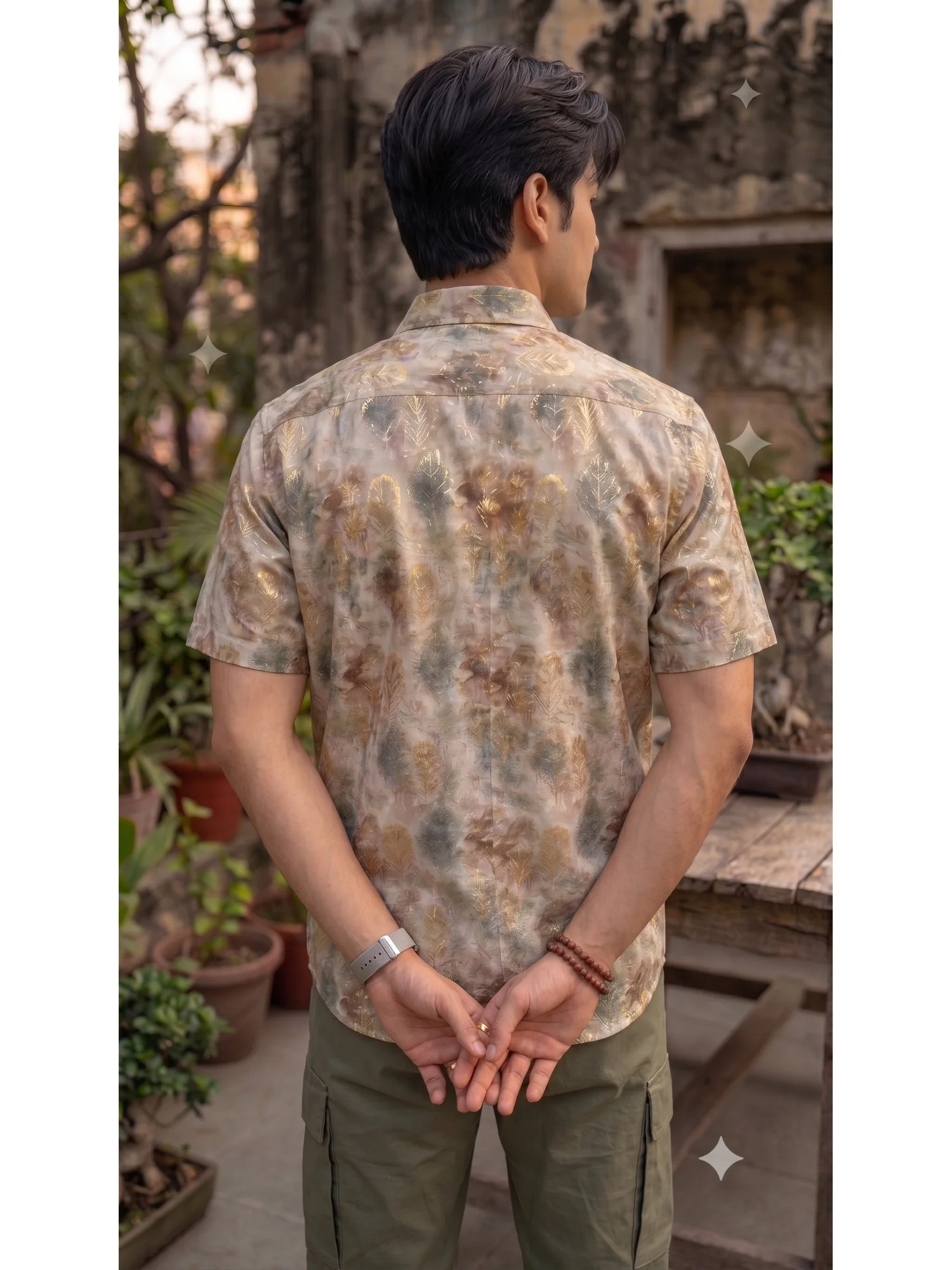 Short sleeved shirt, beige, brown and green pattern, back view, worn by a model