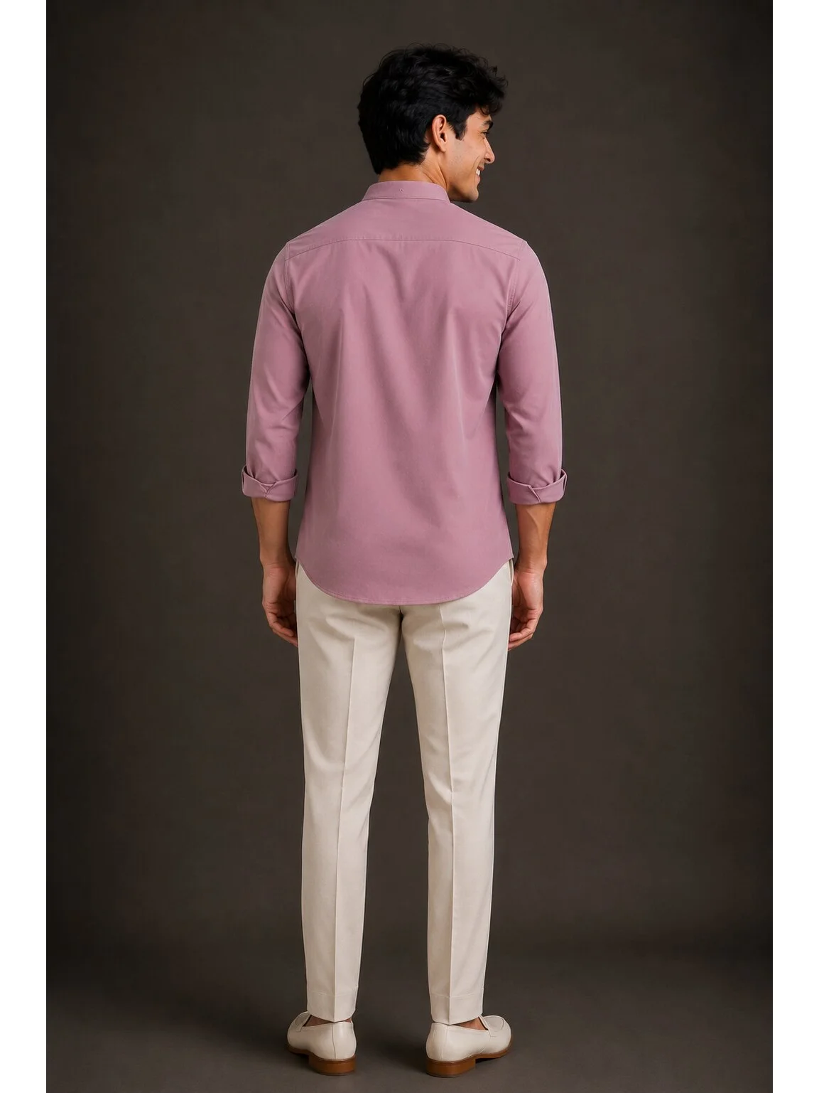 Pink kurta, back view, worn by a model, three-quarter sleeves rolled up