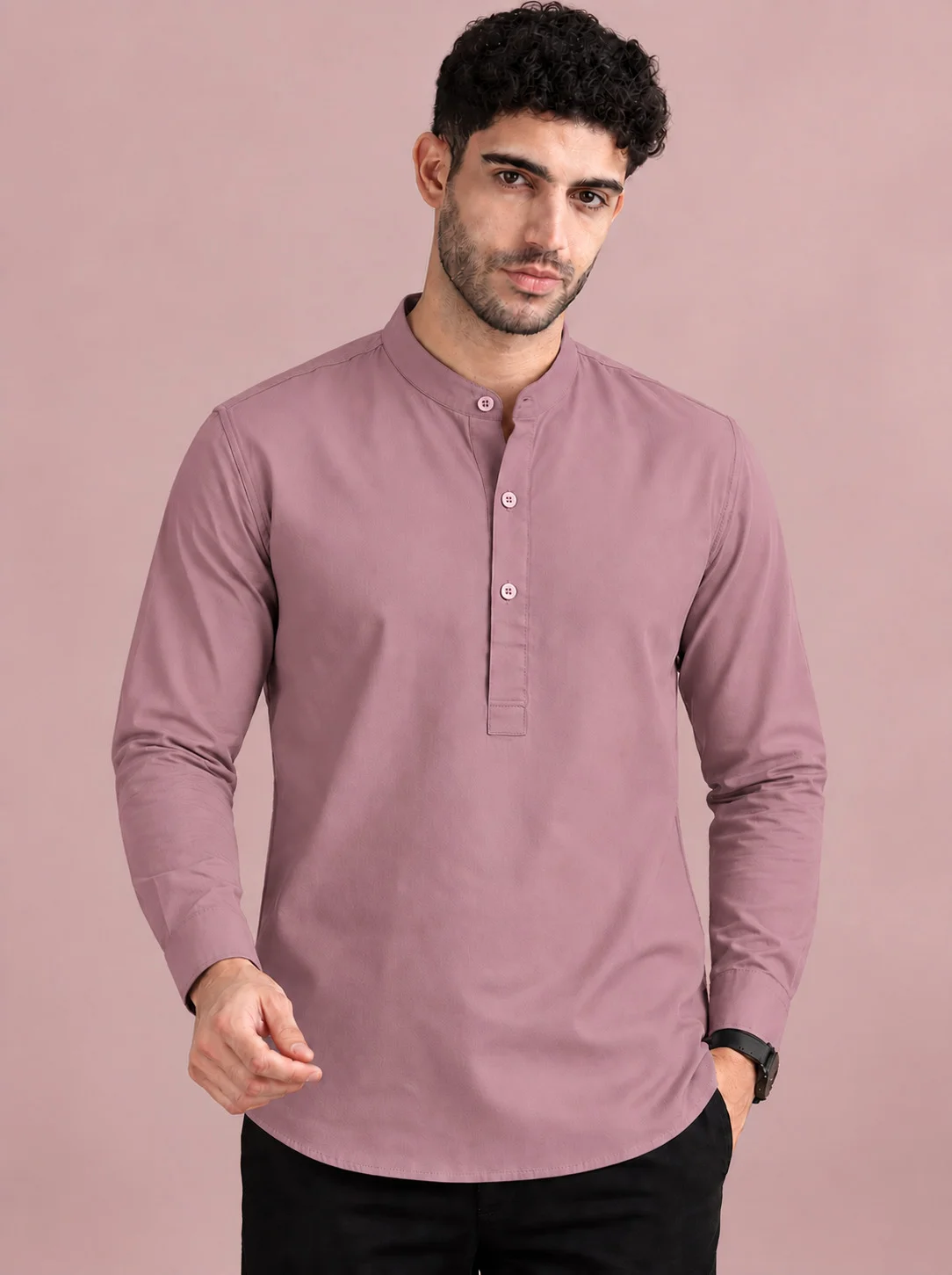 Mauve kurta, long sleeves, mandarin collar, buttons down front, worn by a model