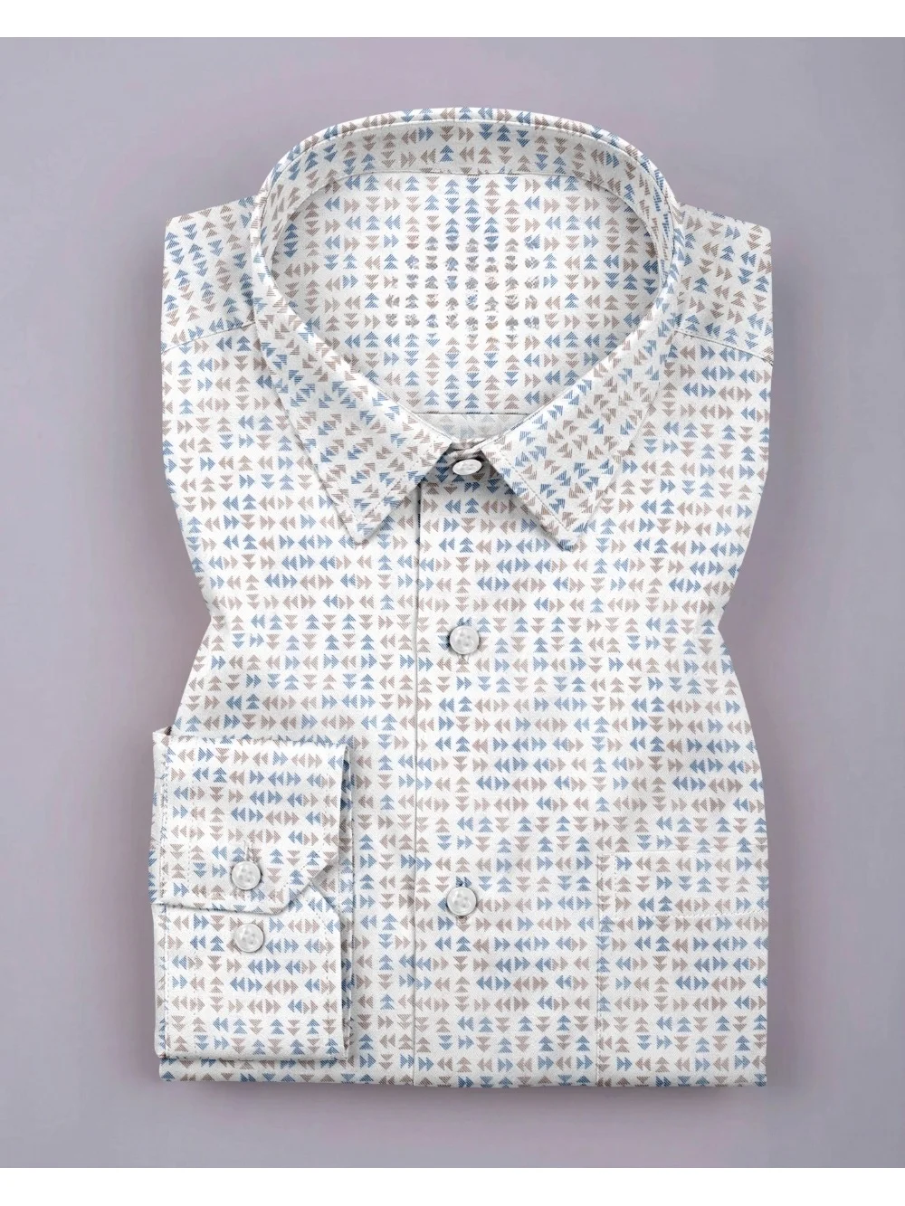 White, blue and brown patterned dress shirt, folded, collar visible, buttons, pocket