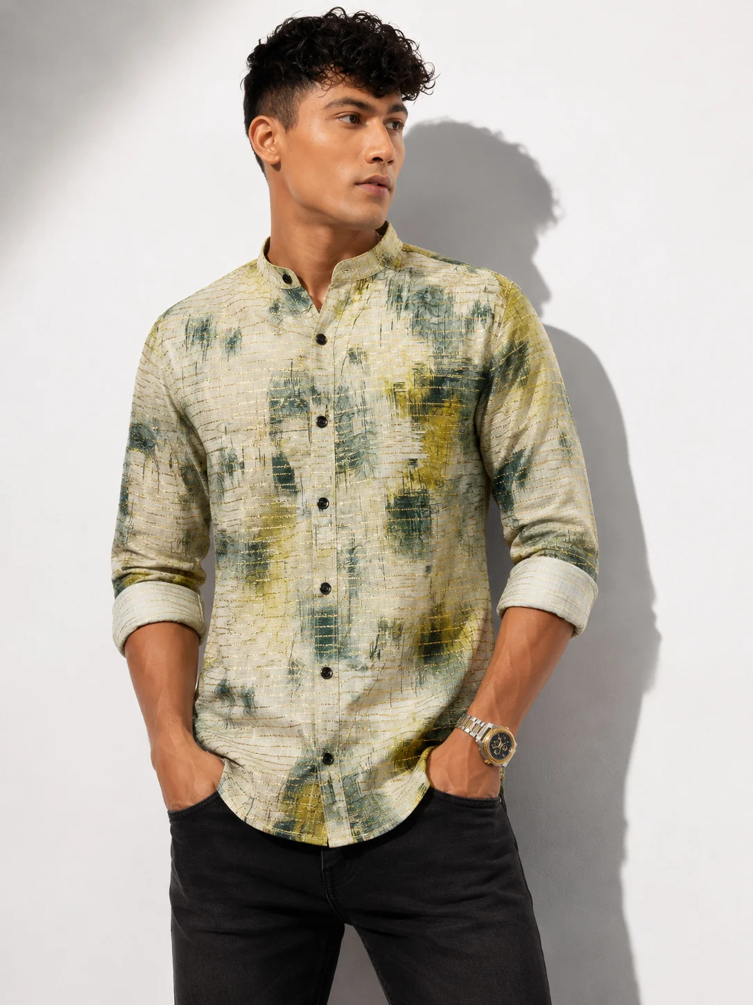 Long sleeve shirt, sage green and beige abstract pattern, mandarin collar, black buttons, worn by a model