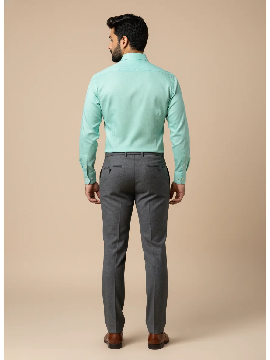Sea green long-sleeve shirt, back view, worn by a model, point collar, button cuffs