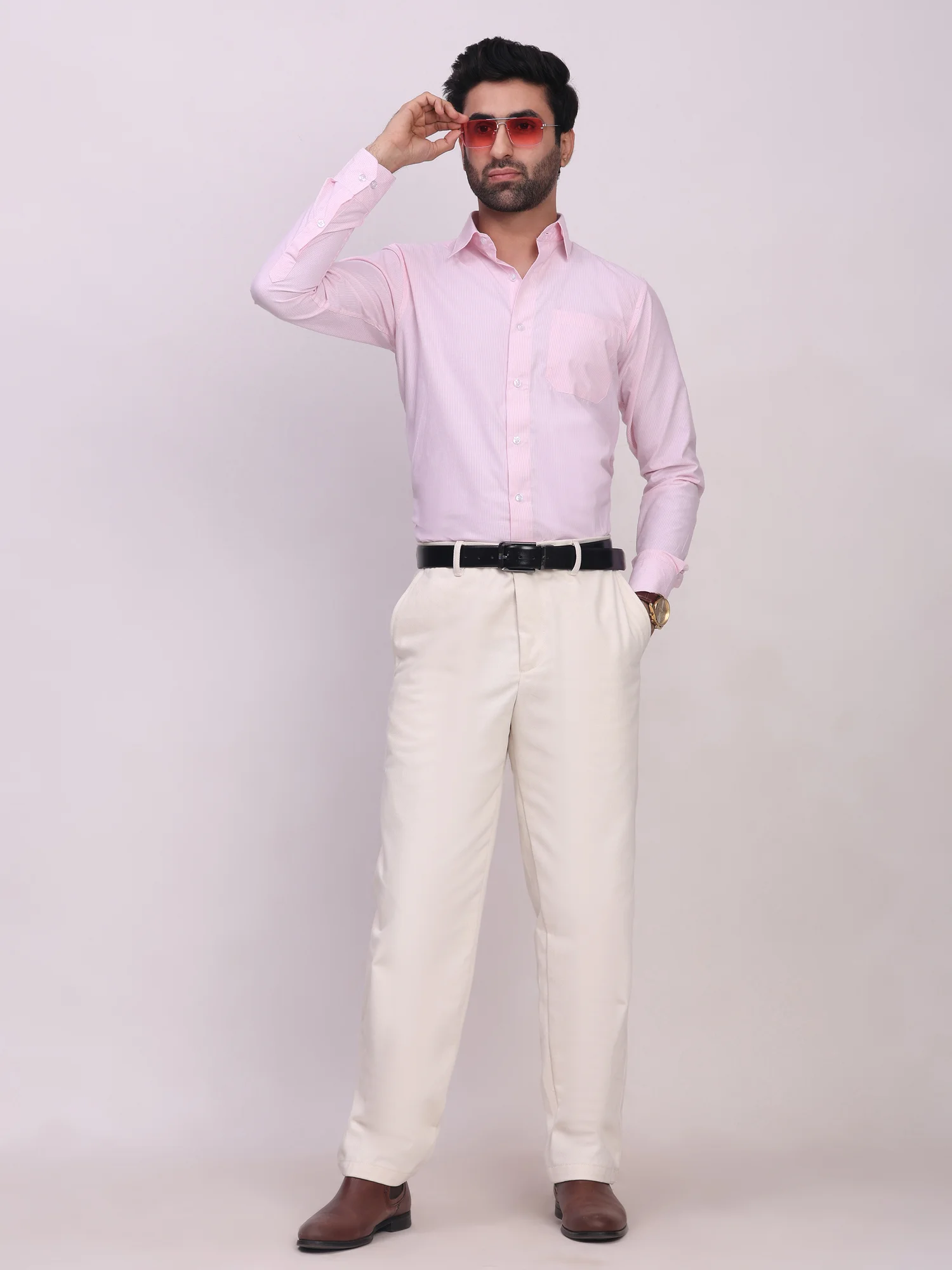 Pink striped shirt, front view, worn by a model, long sleeves, collar visible