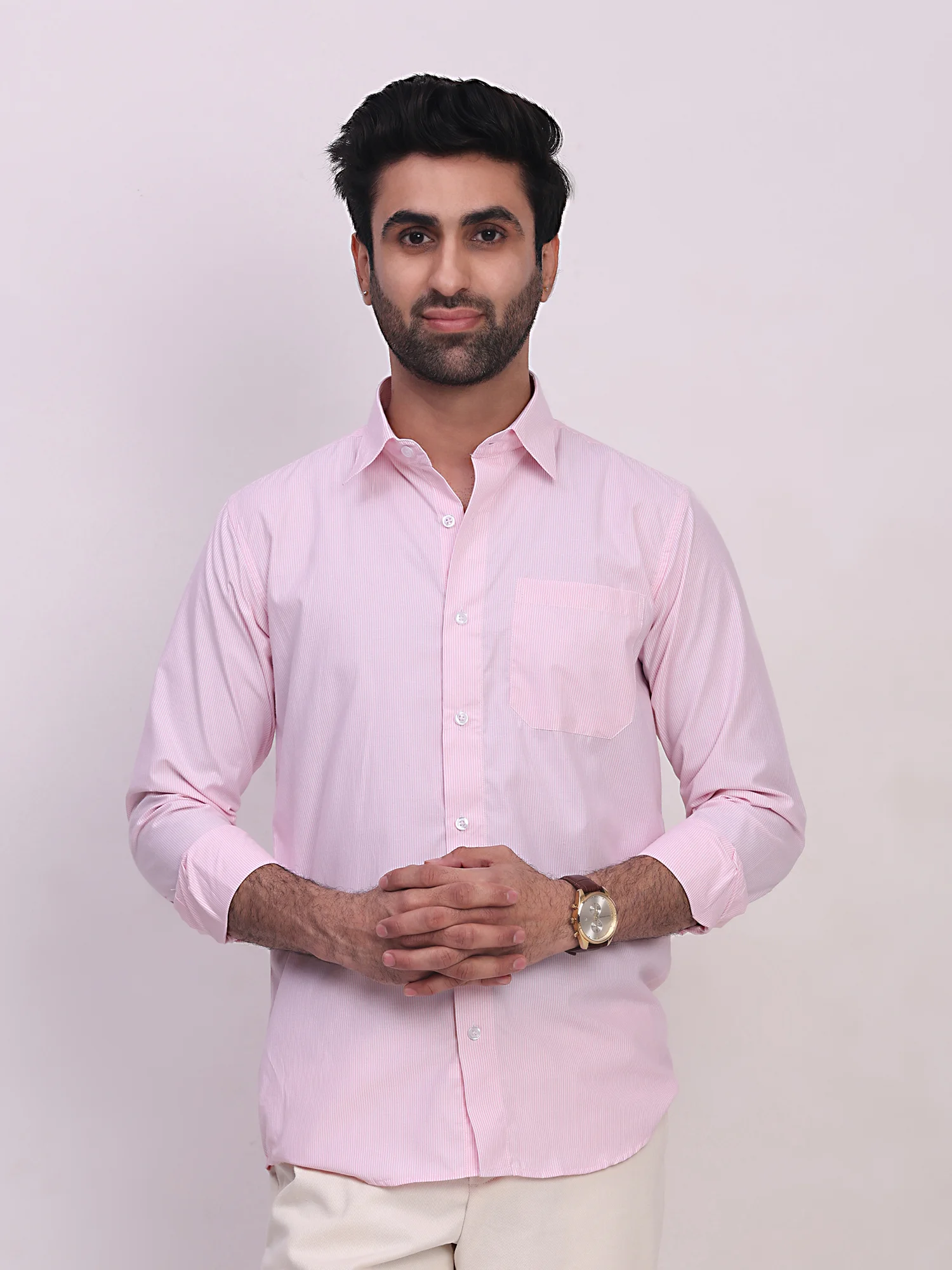 Pink striped shirt, front view, worn by a model, long sleeves, collar, chest pocket