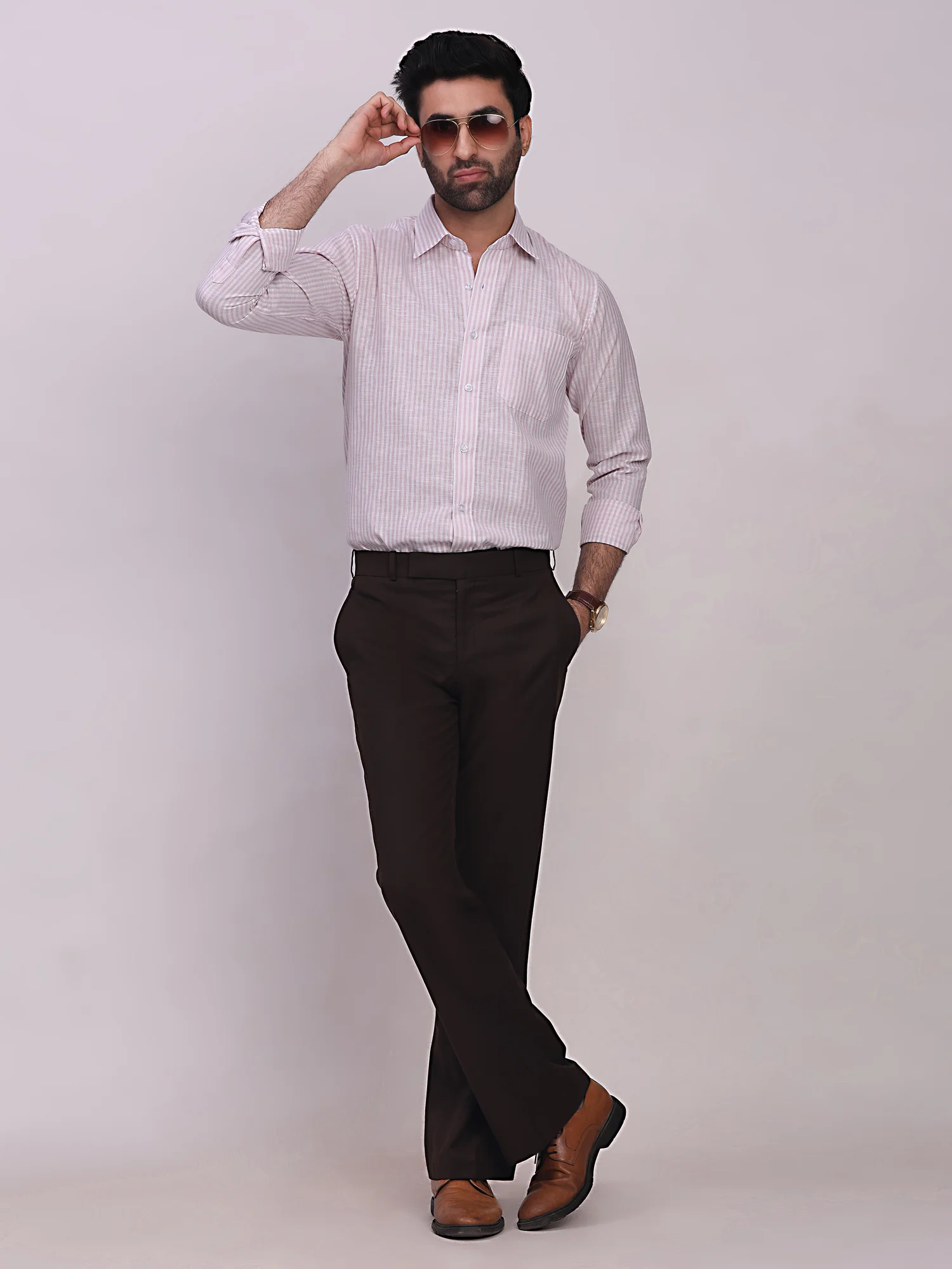 Pink striped shirt, front view, worn by a model, long sleeves, collar visible