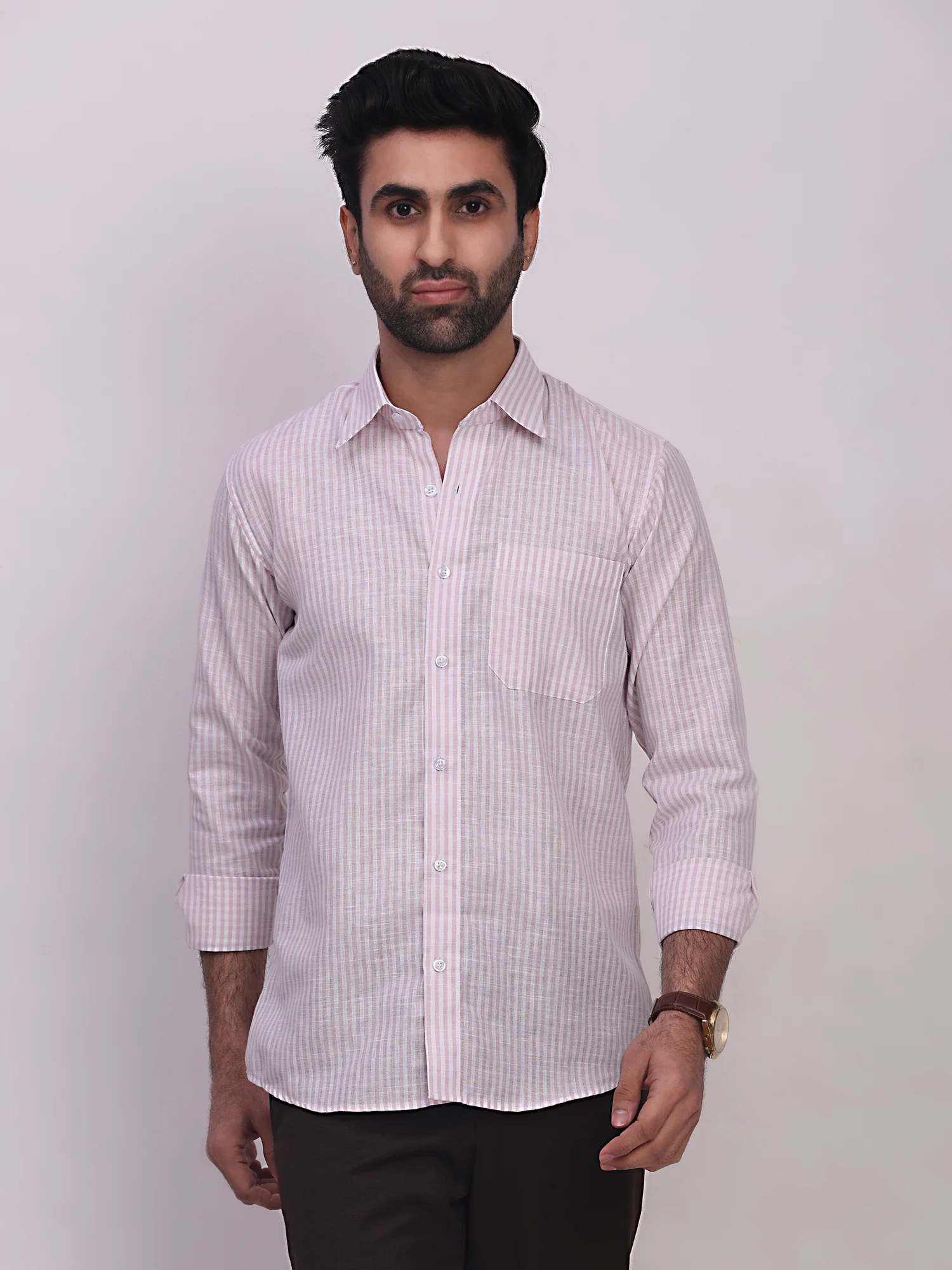 Pink striped shirt, front view, worn by a model, collar, buttons, cuffs, pocket