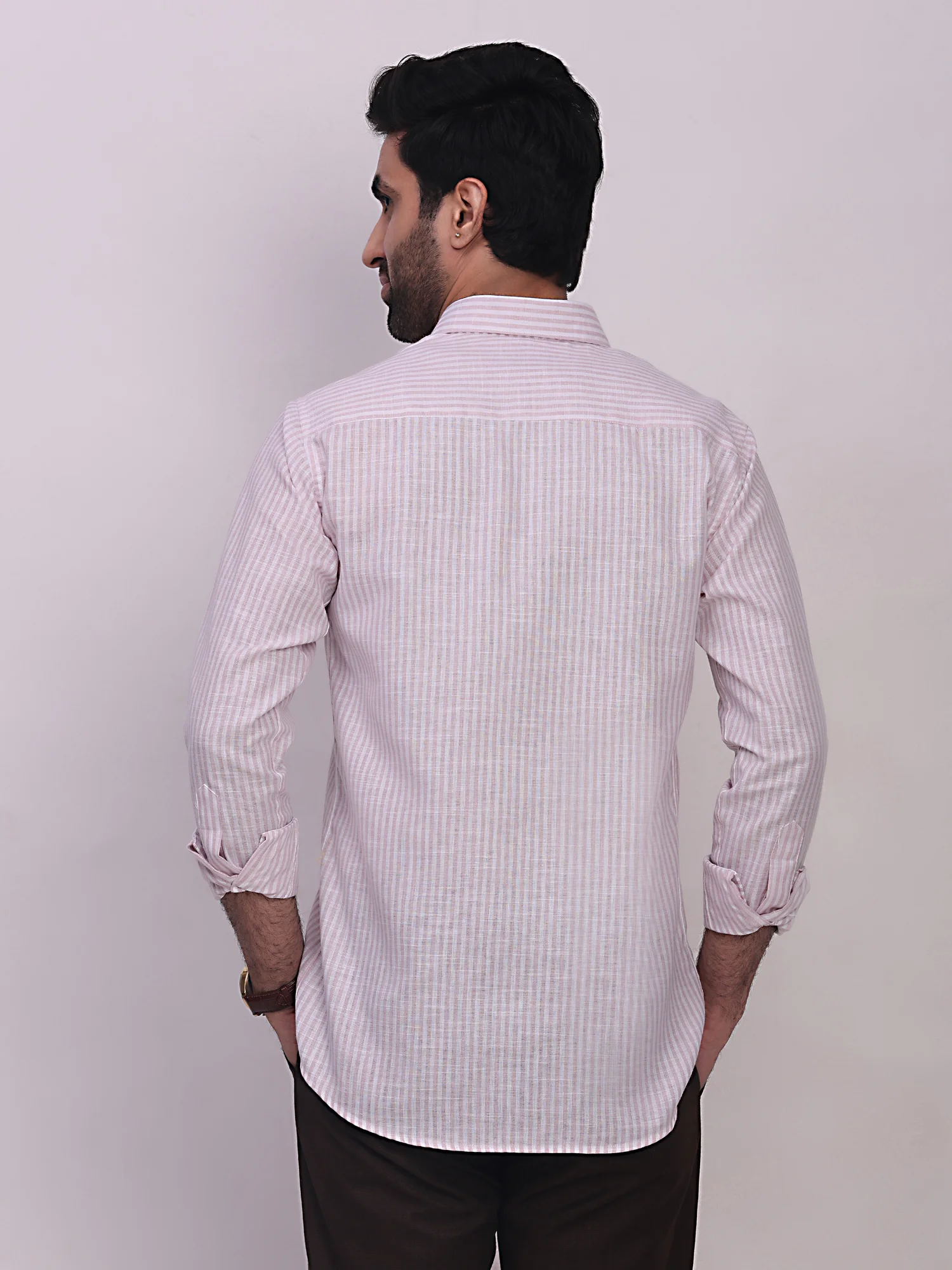 Pink and white striped shirt, back view, worn by a model, long sleeves, collar