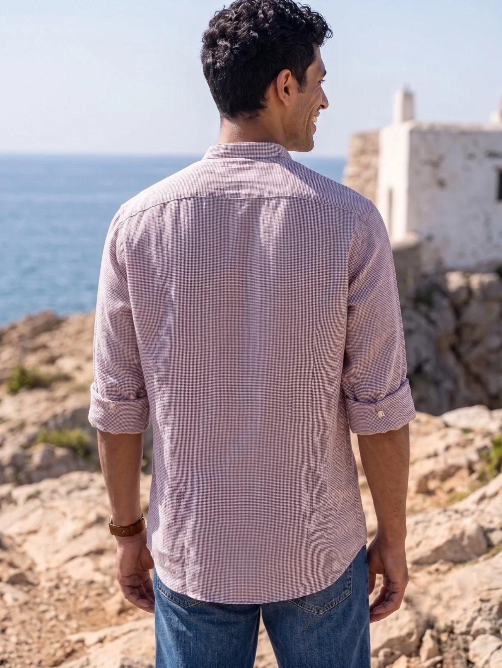 Pink gingham kurta, back view, worn by a model, rolled sleeves