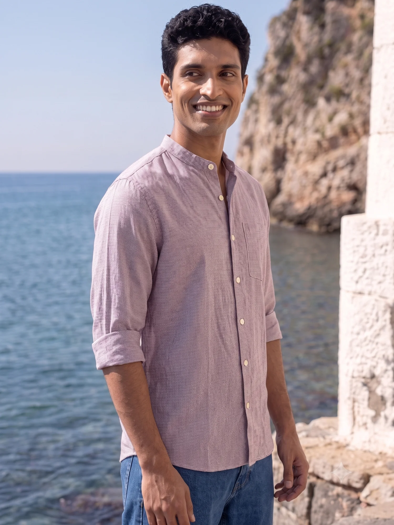 Pink shirt, mandarin collar, buttoned front, rolled sleeves, pocket on chest, worn by a model