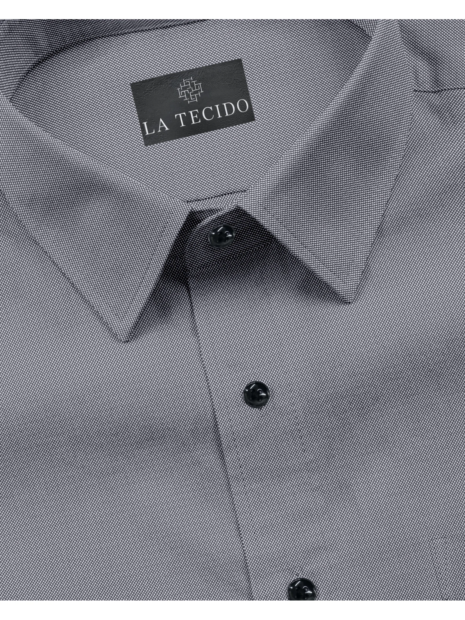 Grey dress shirt, collar and buttons visible, close-up