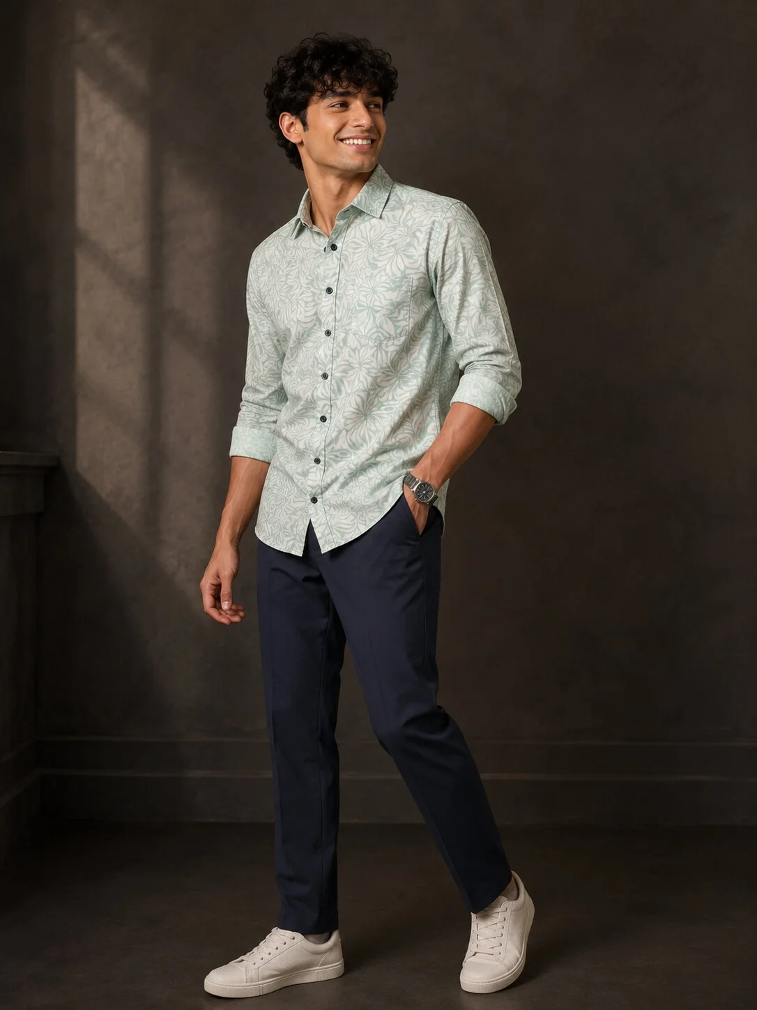 Mint green and white patterned shirt, front view, worn by a model, rolled sleeves, collar visible, buttons down front