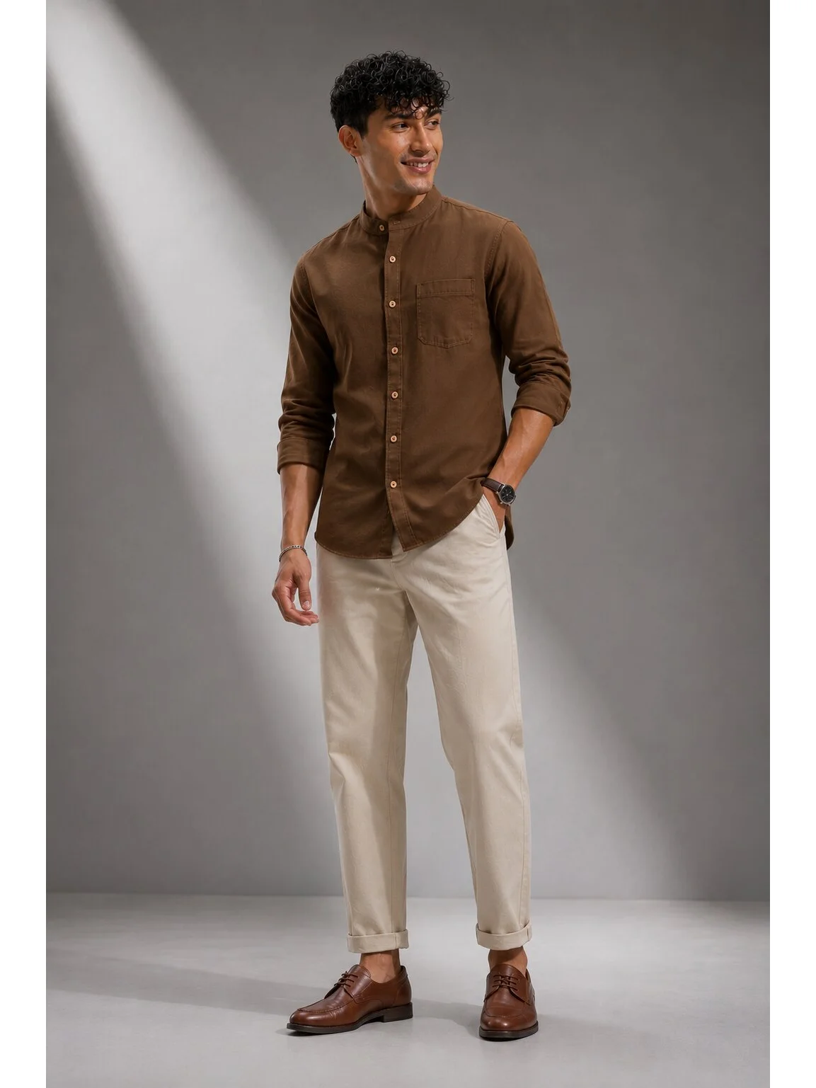 Coffee brown long sleeve kurta with mandarin collar and chest pocket, worn by a model facing front