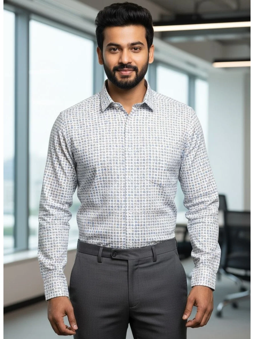 Front view of a man wearing a white geometric print long-sleeve shirt and grey trousers