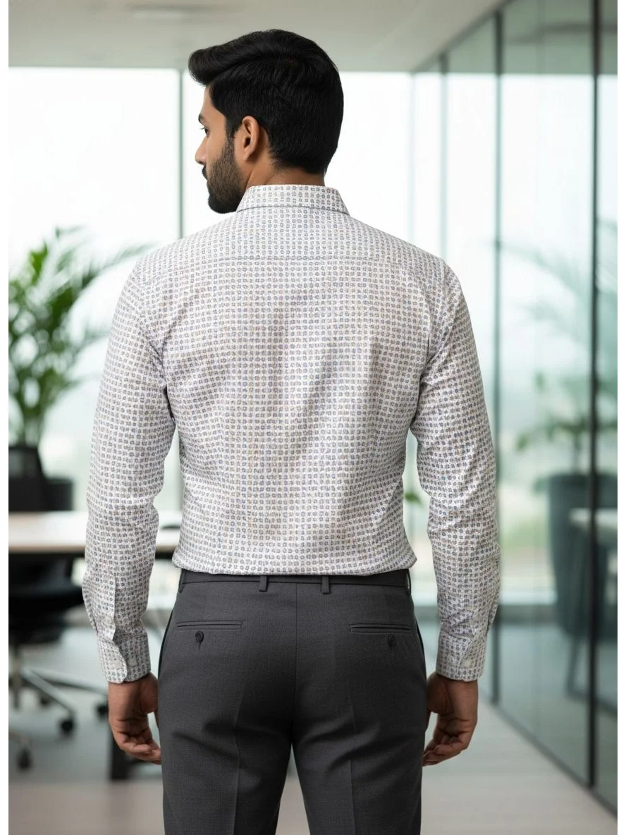 Rear view of a man wearing a white patterned long-sleeve shirt with full sleeves and grey trousers