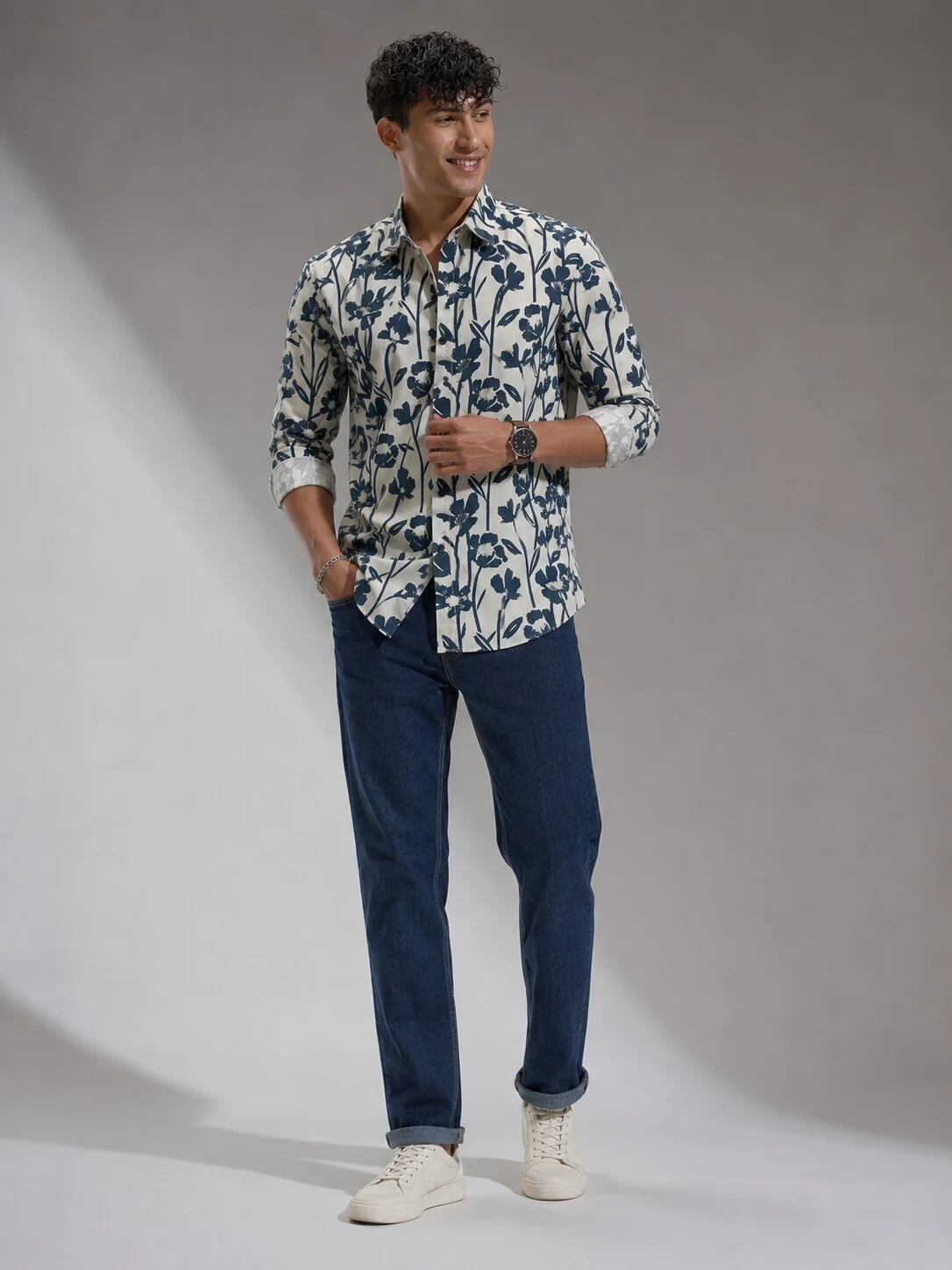 Shirt, white with blue floral print, collar, buttons, 3/4 sleeves, worn by a model