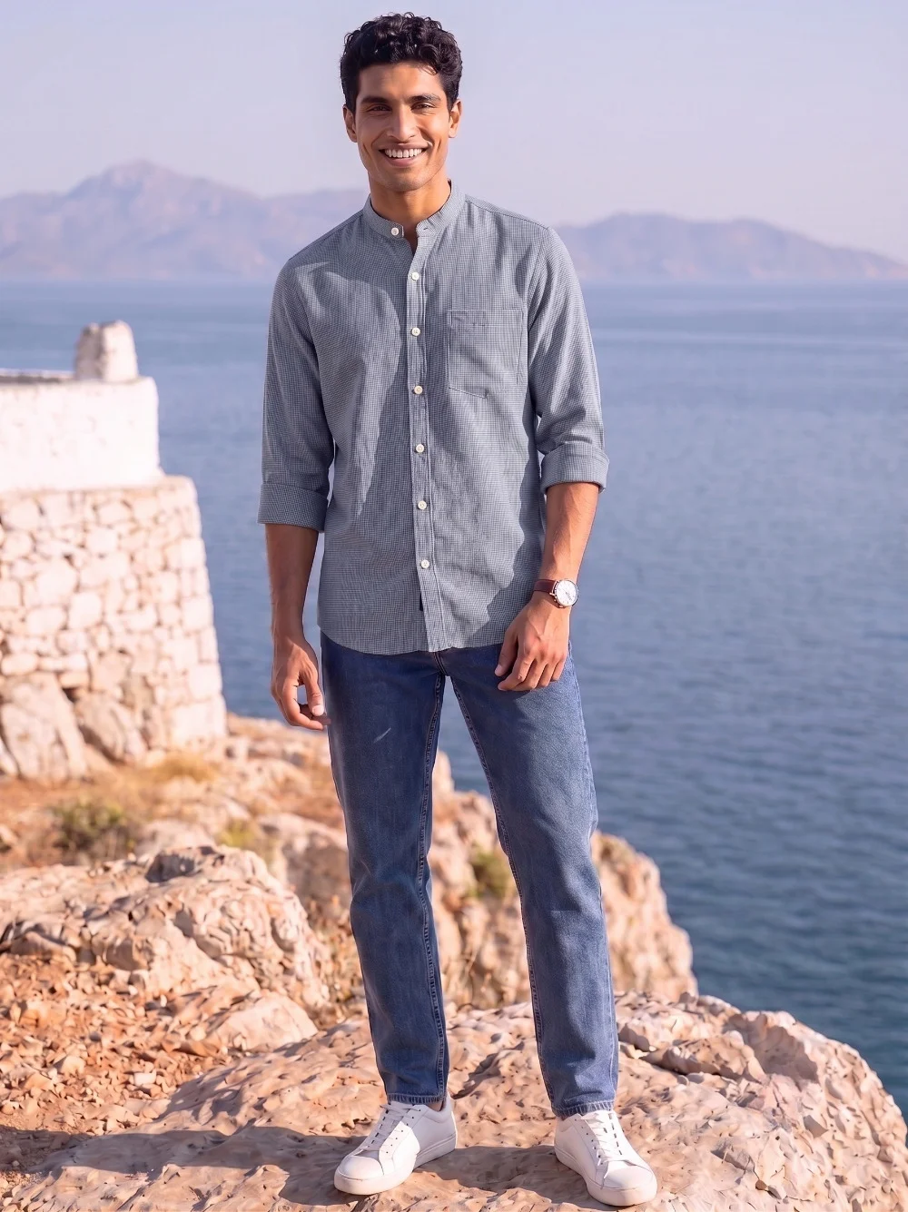 Long sleeve shirt, light blue colour, mandarin collar, buttons, pocket, worn by model