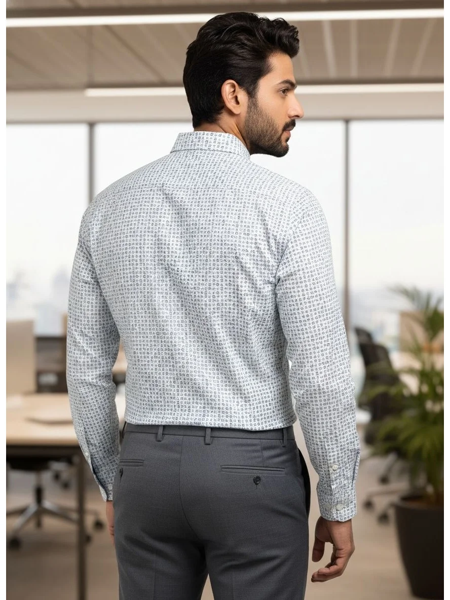 Back view of a model wearing a long-sleeve white shirt with a small blue geometric print and grey trousers