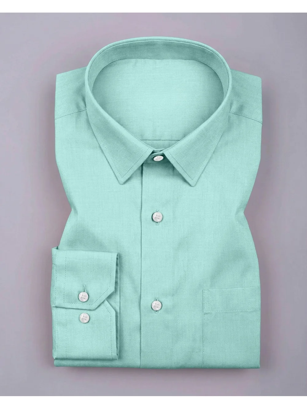 Folded mint green long-sleeve shirt, front view with buttons, collar, and chest pocket